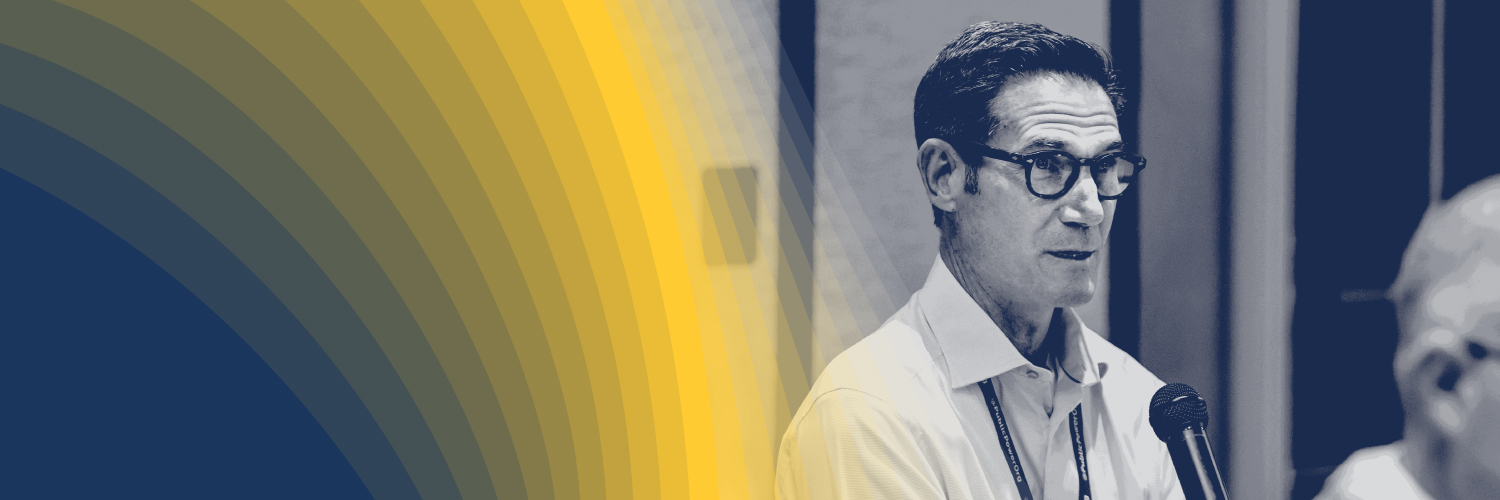 Person speaking into microphone