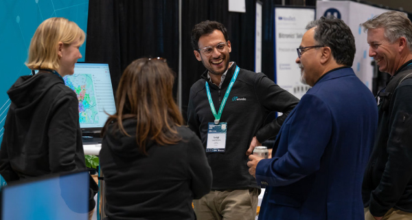 Group of people talking at the 2025 Engineering and Operations Conference Expo