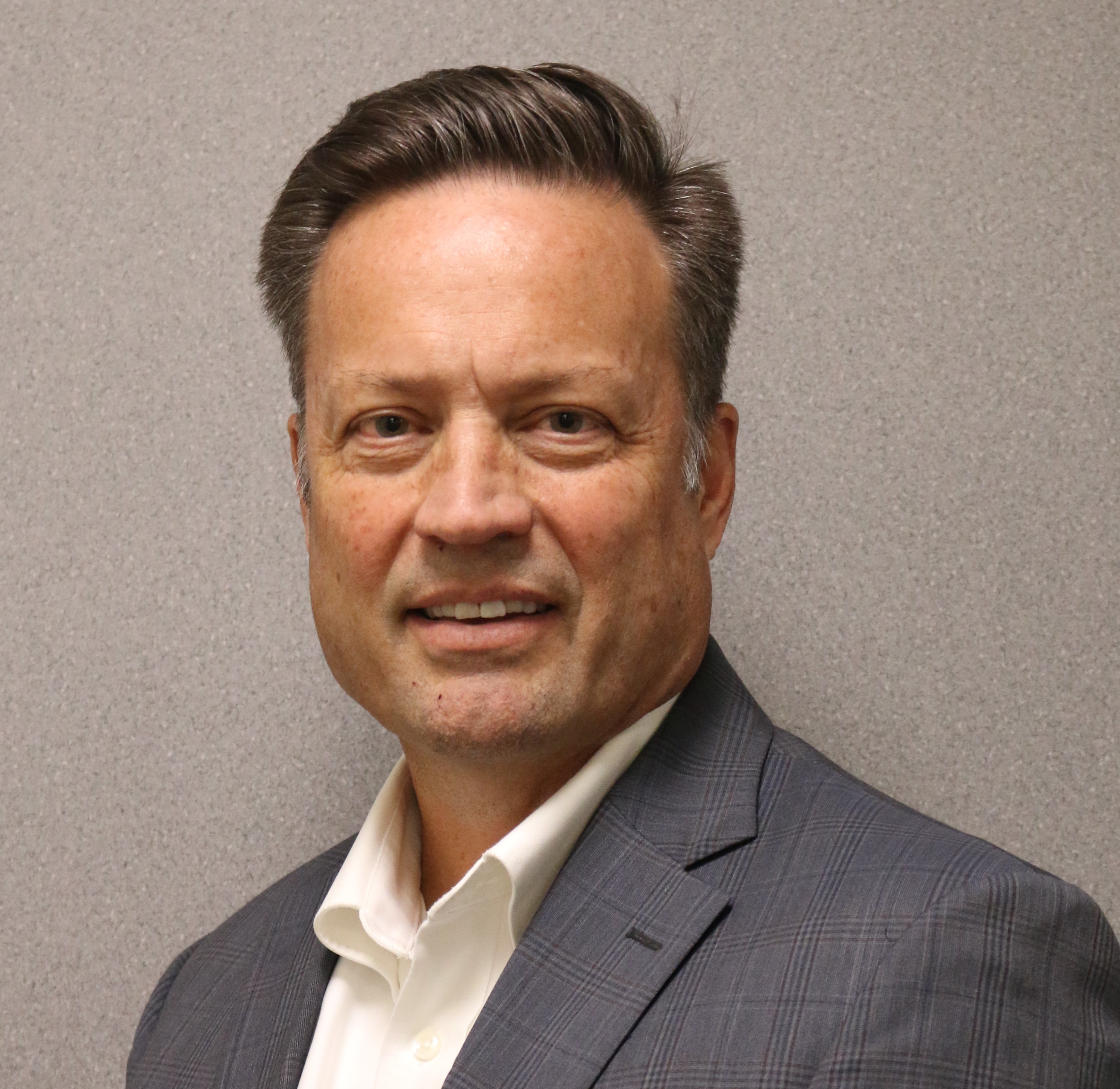 Headshot of Tom Barry, CEO of MMWEC