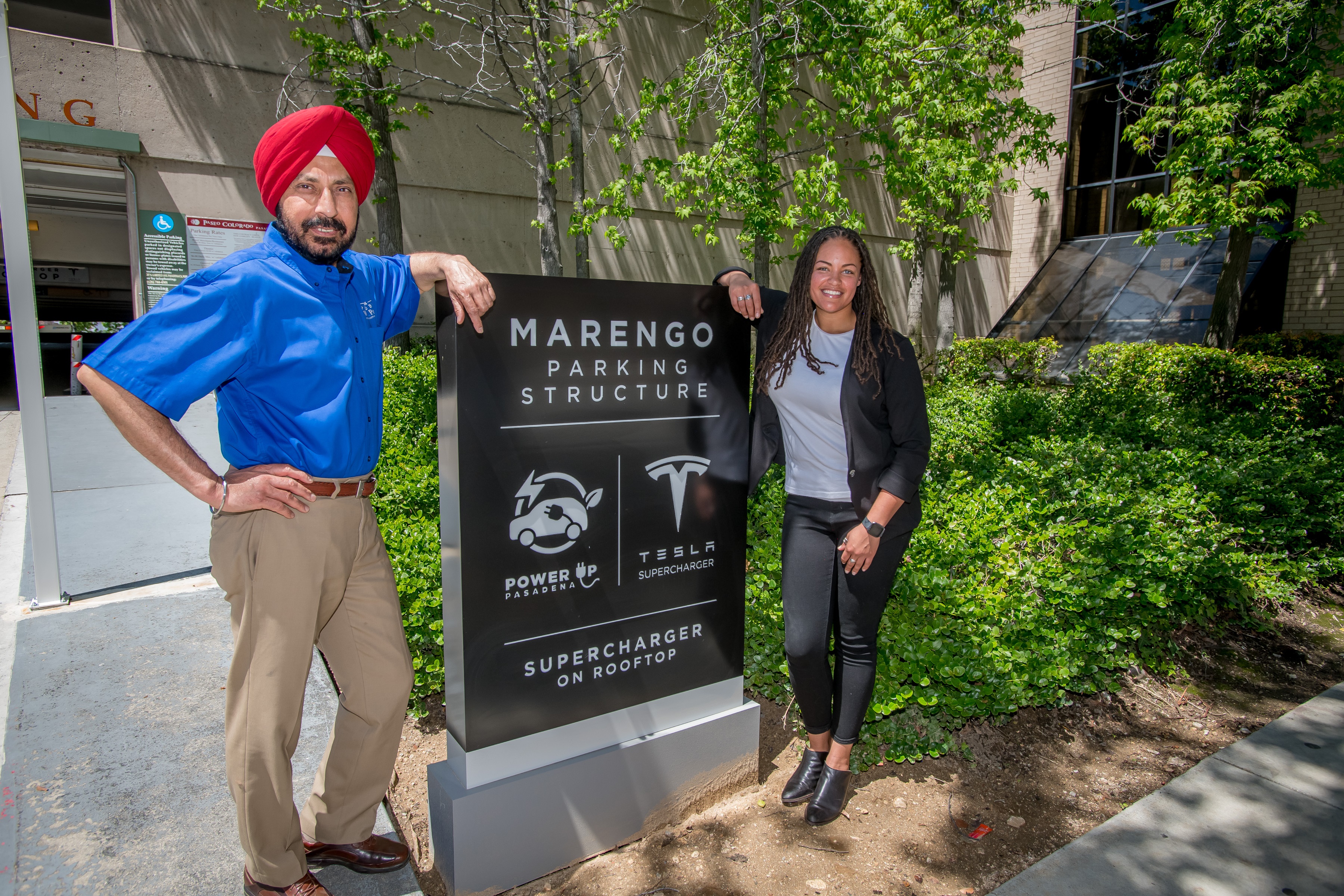 Pasadena Water and Power general manager Gurcharan Bawa and Tesla's Regional Manager Taylor Steele at Marengo Charging Plaza