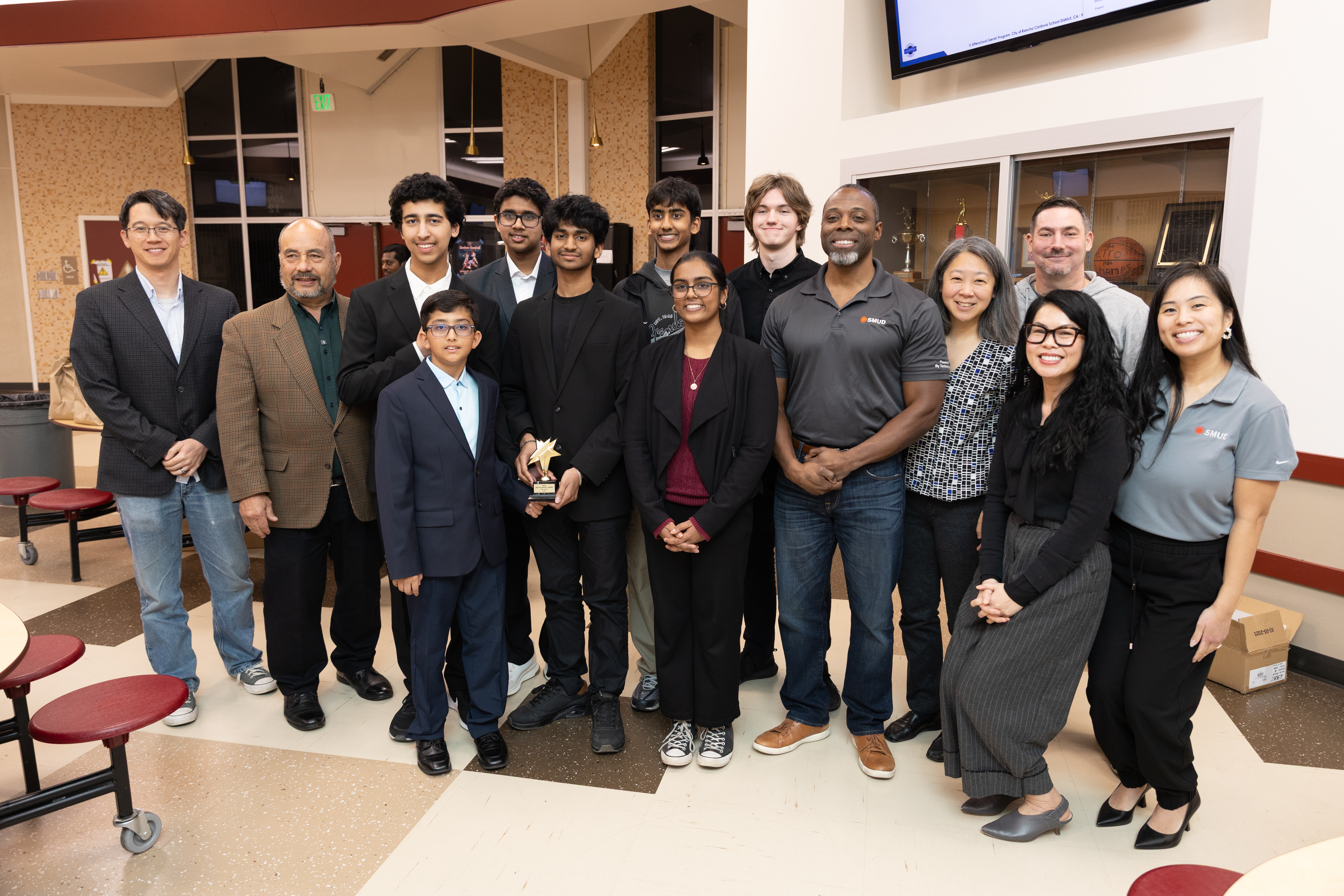 SMUD employees honoring a group of Cordova High School students with an Energy Award