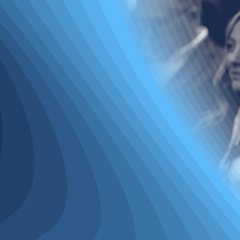 Black-and-white image of people listening to a conference session with a blue graphic overlay