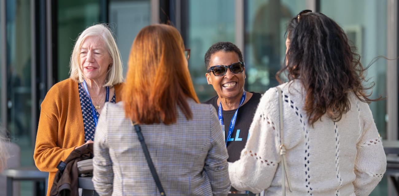 People laughing at conference