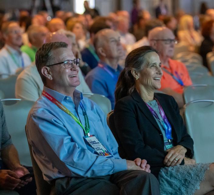 Group of people attending a presentation 