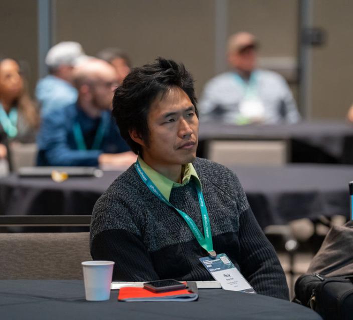 Person listening during conference session