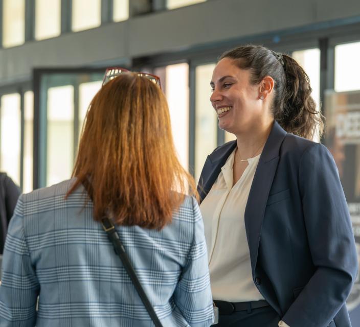 People talking at conference