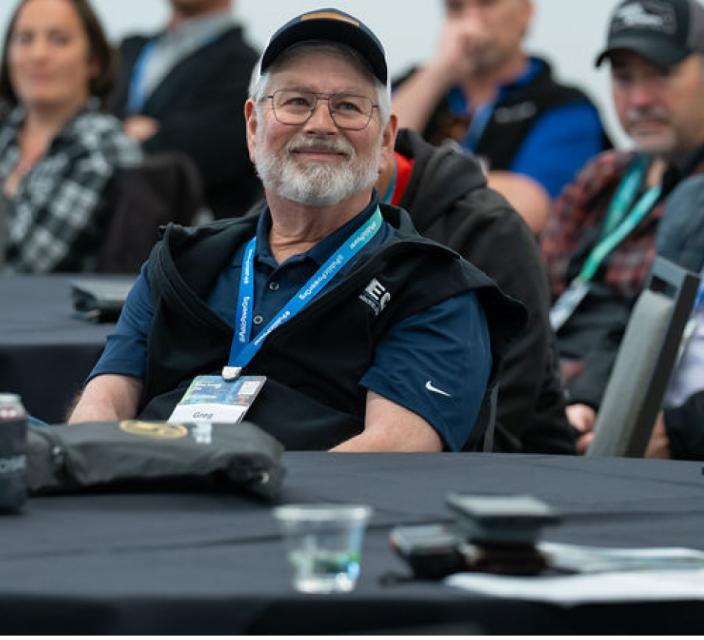 People listening during a conference session