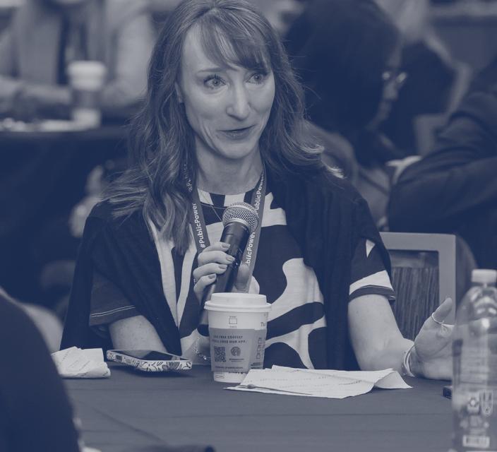 Person speaking into microphone