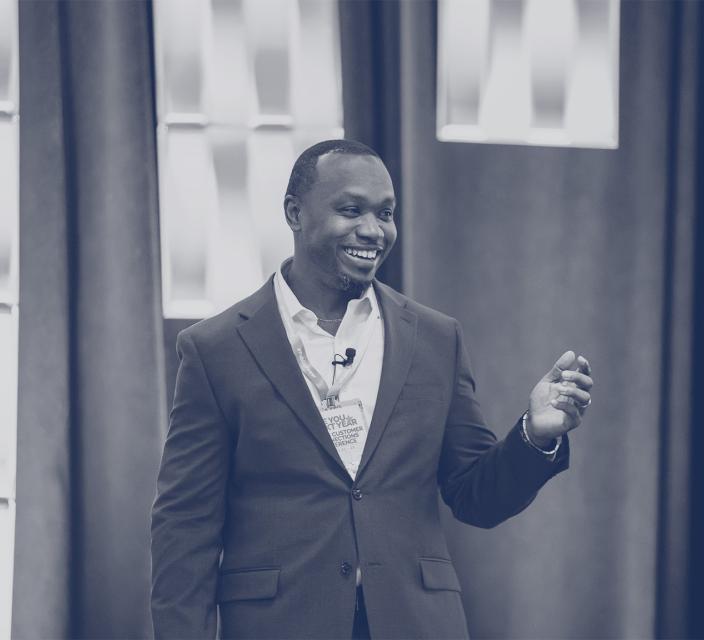 Person speaking at conference session