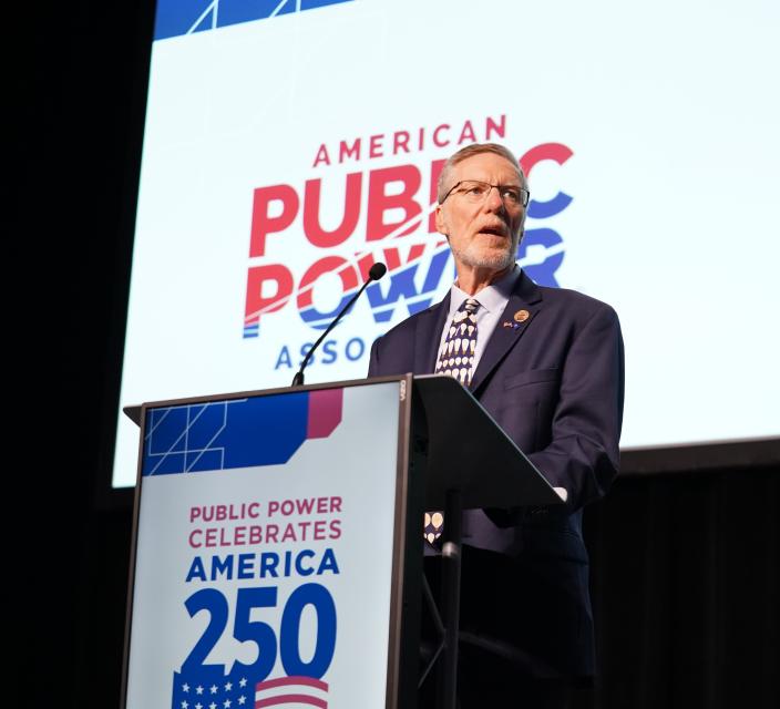 Mike Pieters speaking at a podium