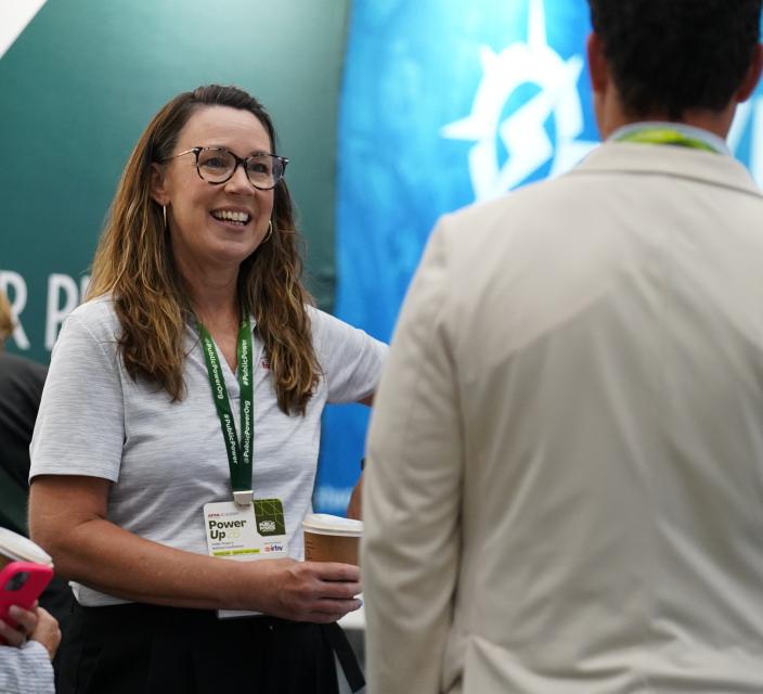People networking in conference expo hall