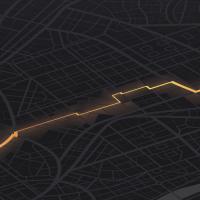 Illuminated directional path on a black background