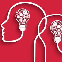 Outline of two heads with bulbs in the middle with cogs