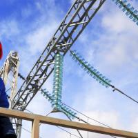 Utility worker inside a substation