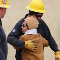Navajo Nation resident hugs volunteer lineworker crews participating in Light Up Navajo in 2019