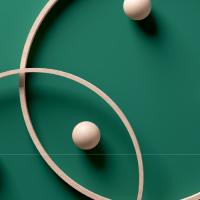 Green background with tan circles