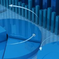 Abstract array of blue three-dimensional pie- and bar-graph visuals