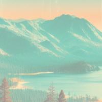 Green mountain and a lake