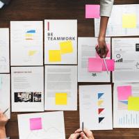 papers scattered on table