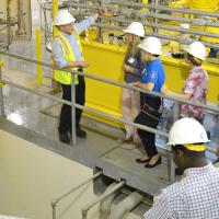 Hamilton utilities employee giving tour of the Meldhal hydro plant