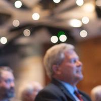 group listening to speaker at general session