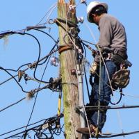 Crewmember from Lakeland Electric helping with emergency response