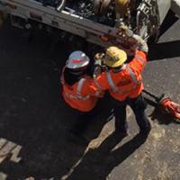 Crew from Danville Utilities in Virginia doing storm restoration work