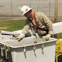 Electric Cities of Georgia worker in a bucket truck