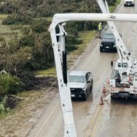 KPUB disaster response team with bucket trucks