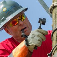 safety-rodeo-lineworker-on-pole