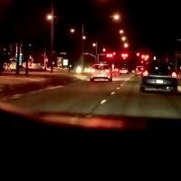 view from car dashboard at night