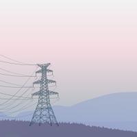 Transmission lines with mountains in the background