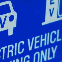 electric vehicle parking only sign