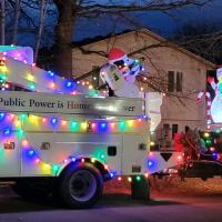 Princeton Public Utilities Commission bucket truck decorated for a Christmas parade