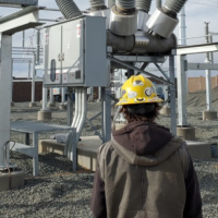Crew member observing the Platte River severance substation
