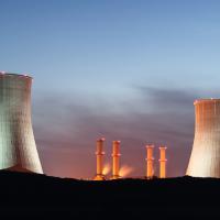 nuclear plant cooling towers at night