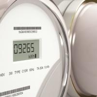 Close cropped view of a line of electric meters