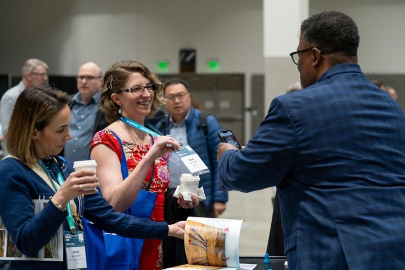 A person scans an attendee's badge at the APPA National Conference