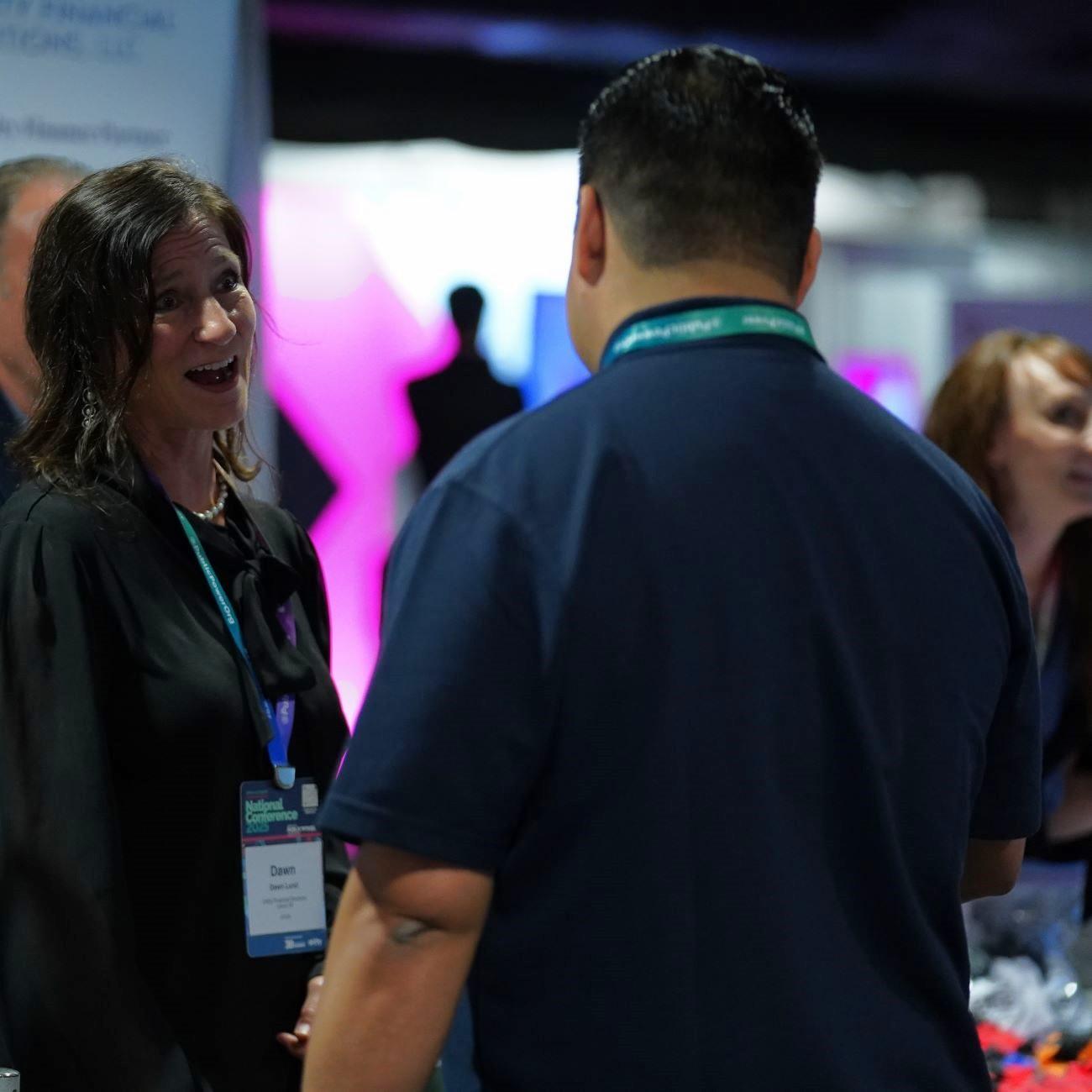 People talking at APPA's 2025 National Conference expo hall