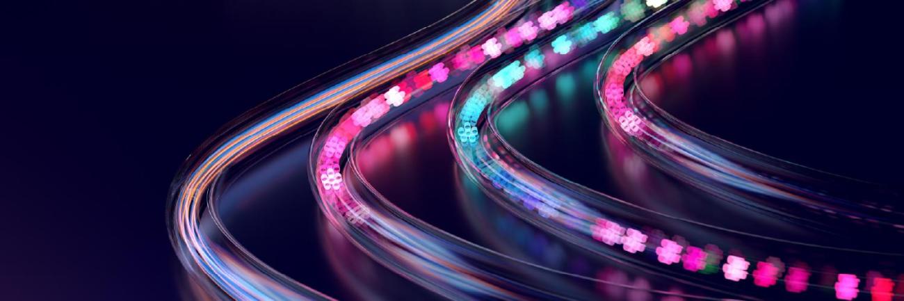 glowing multicolored light strands on a black background