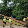 Crews with Marquette Board of Power and Light install new utility poles