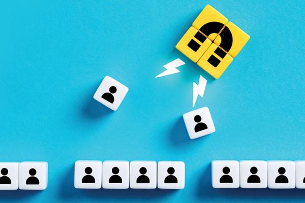 block with magnet icon attracting blocks with people icons