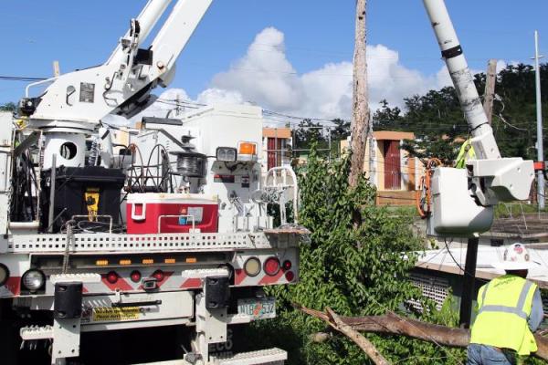 Utility crews repairing storm damage 