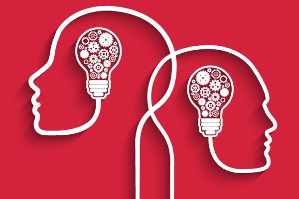 Outline of two heads with bulbs in the middle with cogs