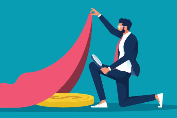 Man in a suit lifting up a red blanket, revealing a gold coin underneath