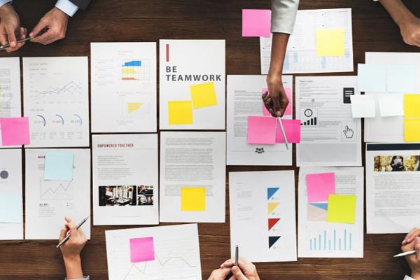 papers scattered on table