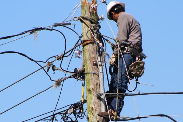 Crewmember from Lakeland Electric helping with emergency response