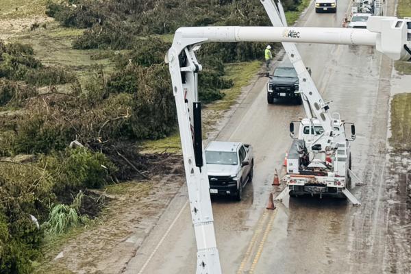 KPUB disaster response team with bucket trucks