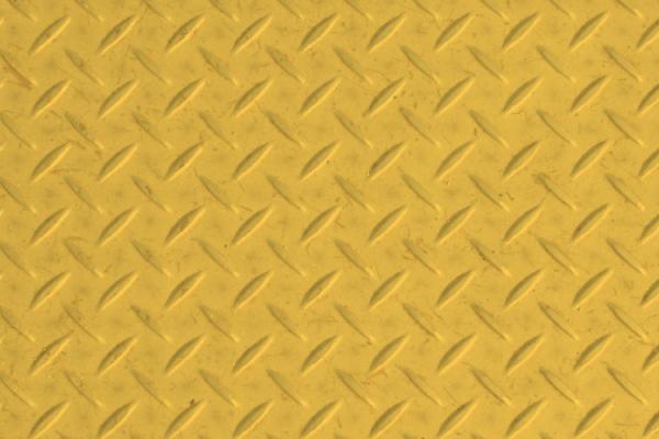 textured metal sheet in yellow