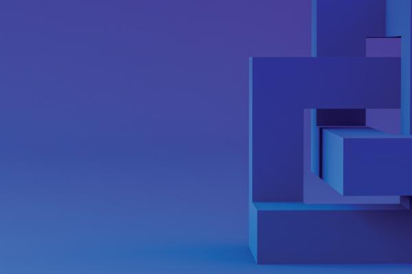 Interlocked cube toy on blue background